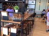 Black powder coated shelving for cafe