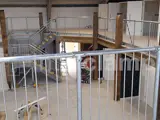 Interclamp steel handrails fitted on an indoor balcony
