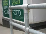 tube clamp fittings on a handrail system for a pedestrian safety barrier