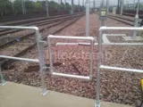 gate and handrail system fitted at railway unit