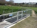 pedestrian safety barrier over river dam bridge made with tube clamp fittings and steel tube