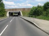 pedestrian handrail barrier placed on the right hand side of a road 