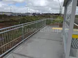 Pedestrian handrail barrier at a bus stop using Interclamp handrails and tube clamp fittings