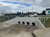 Interclamp tube clamp fittings and tube installed around a culvert. 